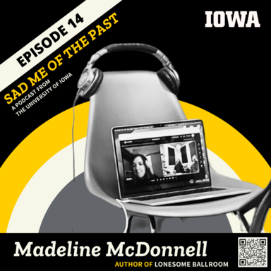 madeline on a computer screen on a chair in the studio