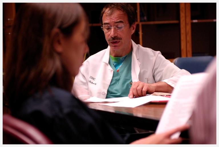 a doctor reading from his creative writing