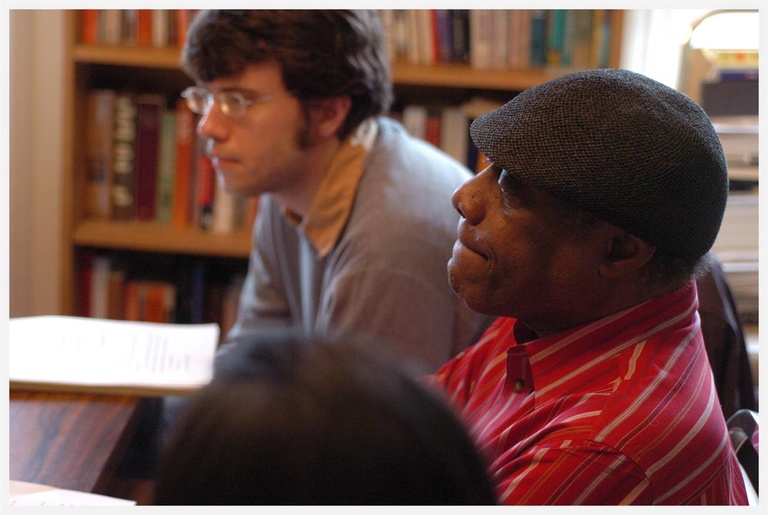 a teacher speaking with students