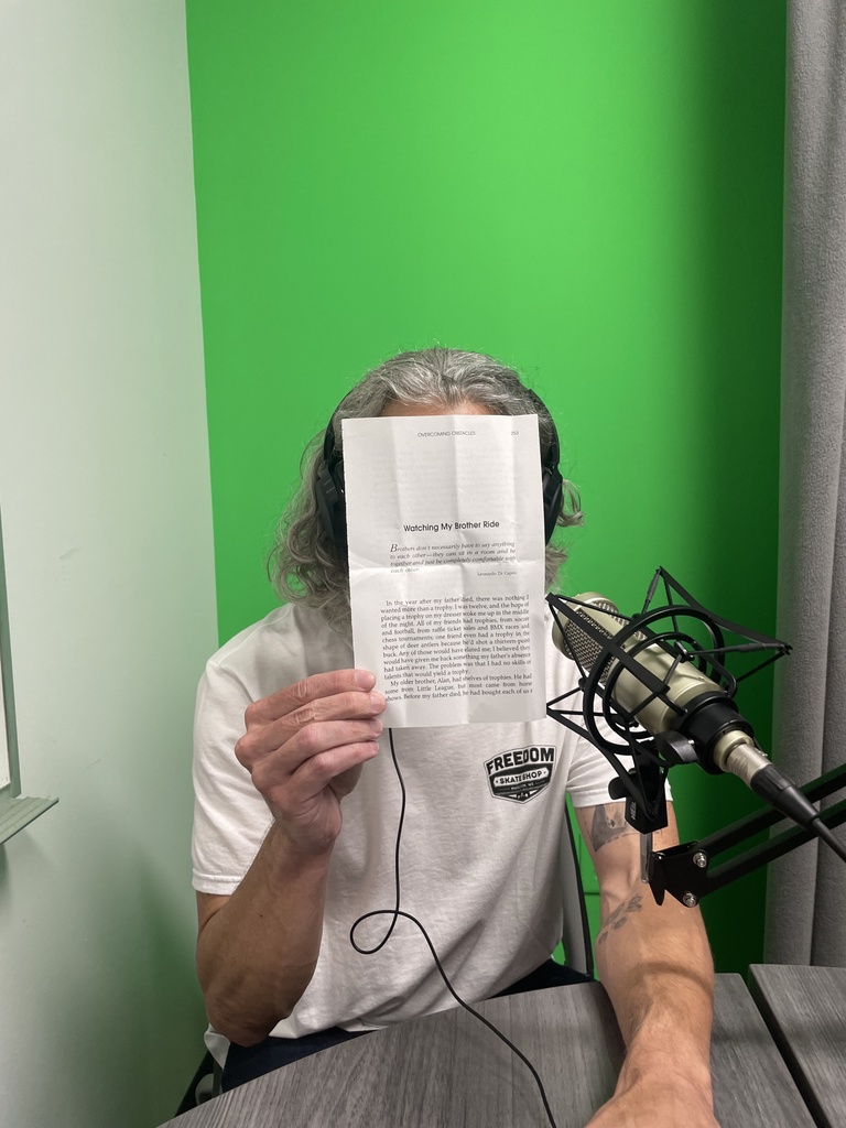 bret holding up a page from chicken soup for the soul