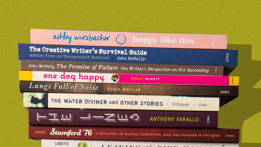 a stack of books on a olive green background